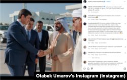 Otabek Umarov (left) and Azizjon Kamilov (second from left) greet Dubai ruler Muhammad bin Rashid al-Maktum upon his arrival in Uzbekistan in October 2019.