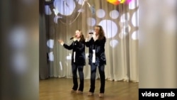 Ukrainian children are taught Russian patriotic songs in Russia.