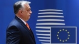 Hungarian Prime Minister Viktor Orban arrives for an EU summit in Brussels. Can Brussels outmaneuver Budapest on Russia sanctions? (file photo)