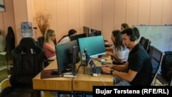 Young people working in the offices of the Kutia software company in Pristina. Aldo Baxhaku, the public communications officer at networking association STIKK, says the information and communications technology sector and its baked-in advantages make it "the only sector that has the potential to fight the emigration trend" in Kosovo.