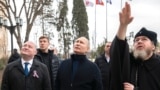 Тихон (справа) с Владимиром Путиным