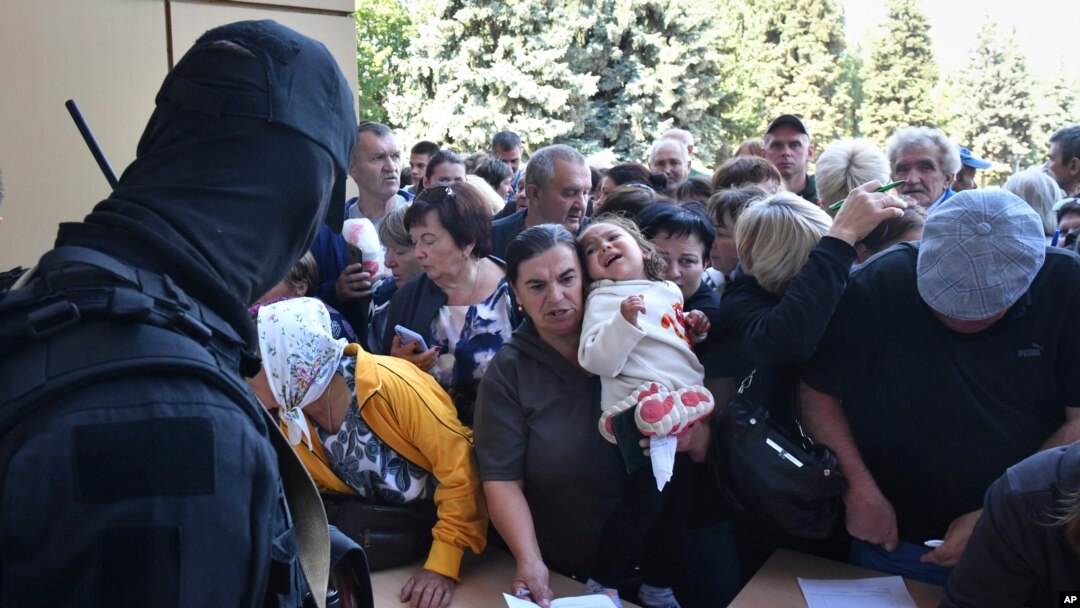 Patience is growing thin as authorities struggle to cope with thousands of people evacuated from Russian regions ahead of Ukraine's advances. 