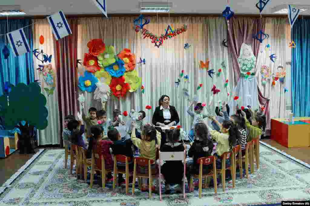 Children attend a Jewish kindergarten inside the Derbent synagogue in April 2023. In the final years of the Soviet Union, Jews began emigrating en masse out of Daghestan and elsewhere in the North Caucasus. 