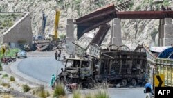 Pakistan's Balochistan Province, seen here in a photo from August after a blast blamed on separatists destroyed a vehicle and collapsed a railway bridge, has been the scene of years of mounting violence.