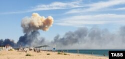 Вигляд на селище Новофедорівка, Саки, де на території російського військового аеродрому сталися вибухи, 9 серпня 2022 року