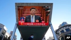 Xi Jinping la ceremonia de deschidere a Congresului Național al Poporului, 5 martie 2022, la Beijing.