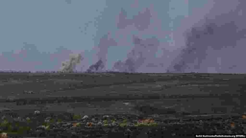 Plumes of smoke rise above the landscape of the Luhansk region after shelling on April 26. 