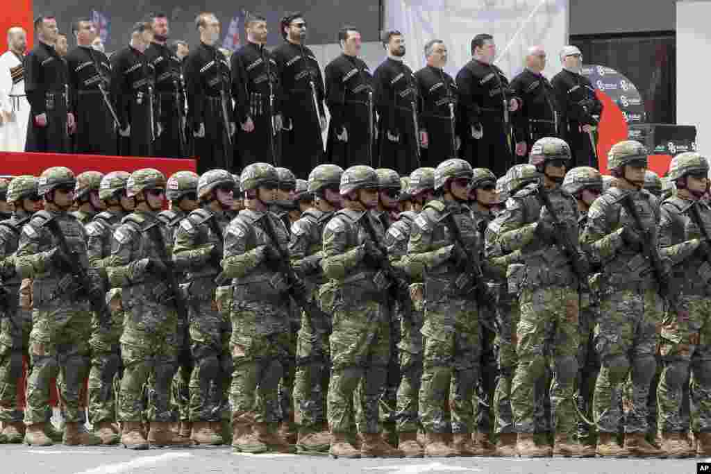 Georgian troops stand ready to march during a celebration of their country's Independence Day in Tbilisi on May 26.
