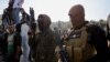 Naoružani palestinski militanti na sahrani Palestinca ubijenog u raciji izraelskih snaga u Jeninu na Zapadnoj obali, 26. januar 2023. 