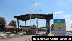 Administrative border with Crimea. Kalanchak checkpoint, Ukraine, 2018.