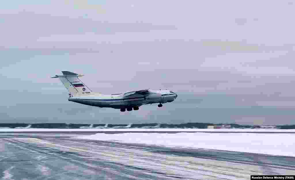 A Russian Ilyushin IL-76 transport aircraft carrying troops departing for Kazakhstan from Chkalovsky Airfield. The CSTO is a military alliance of Russia, Armenia, Belarus, Kazakhstan, Kyrgyzstan, and Tajikistan. 
