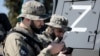 Военнослужащие во время смотра сил чеченских военных подразделений на территории резиденции главы Чечни, 29 марта 2022 года. Иллюстративное фото