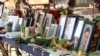 North Macedonia - Kocani - photos of victims during funeral ceremony for victims of fire at Pulse nightclub - screengrab 3