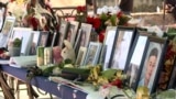 North Macedonia - Kocani - photos of victims during funeral ceremony for victims of fire at Pulse nightclub - screengrab 3