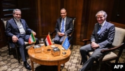 Egypt's Foreign Minister Badr Abdelatty (center) meets with his Iranian counterpart Abbas Araqchi (left) and Rafael Grossi, Director General of the International Atomic Energy Agency in Cairo, June 2.