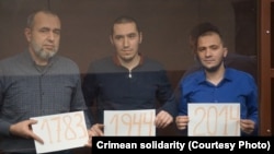 Rustem Seitmemetov (left to right), Seitumer Seitumerov, and Osman Seitumerov appear in court. (file photo)