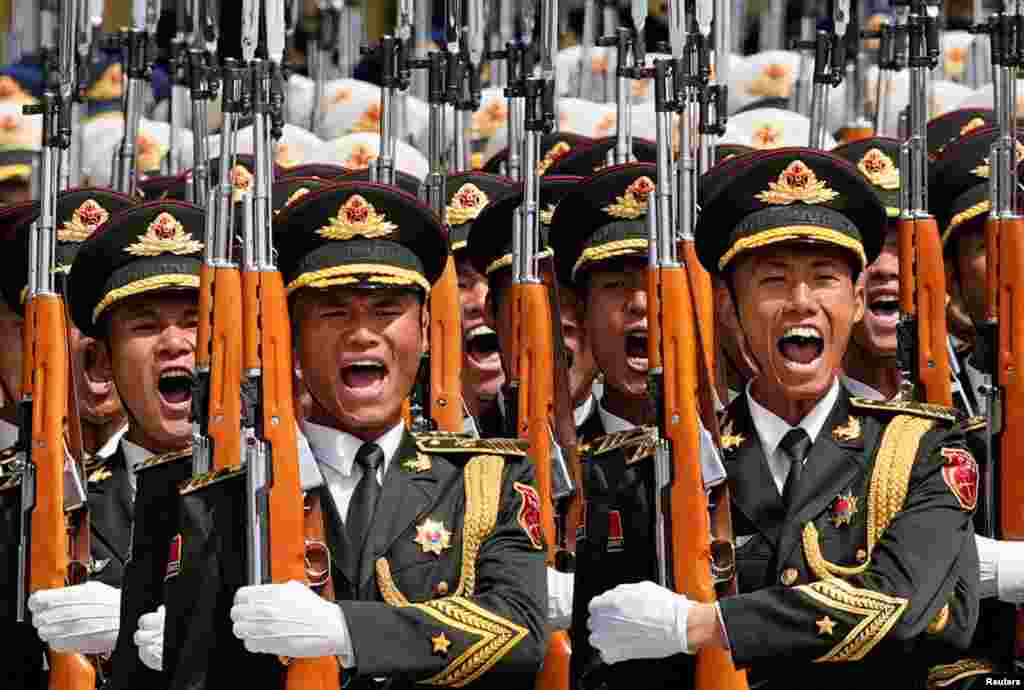 Chinese honor guards take part in a ceremony in Beijing attended by Chinese President Xi Jinping and the visiting Azerbaijani president, Ilham Aliyev.