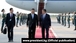 Chinese President Xi Jinping is greeted by his Kyrgyz counterpart, Sooronbai Jeenbekov, on a state visit to Bishkek last year. 
