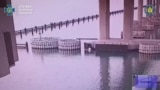 This video taken from footage released by the Ukrainian Security Service on June 3 shows an explosion at the Kerch Bridge connecting Crimea with Russia. The SBU claimed it carried out a special operation.