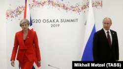 Мей та Путін зустрілися в Осаці