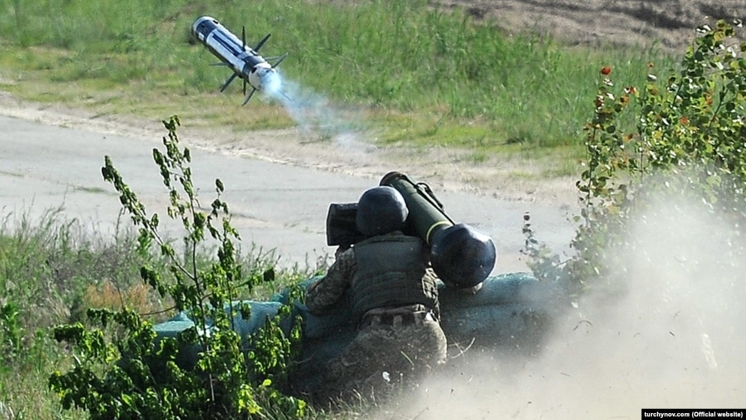 A Ukrainian soldier launches a U.S. antitank missile during training outside Kyiv in May 2018.