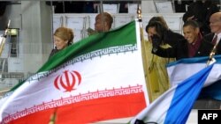 پرچم ایران (درکنار پرچم کشورهای دیگر) در مراسم ادای سوگند باراک اوباما