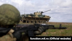 Russian airborne troops take part in exercises in Crimea on March 19.