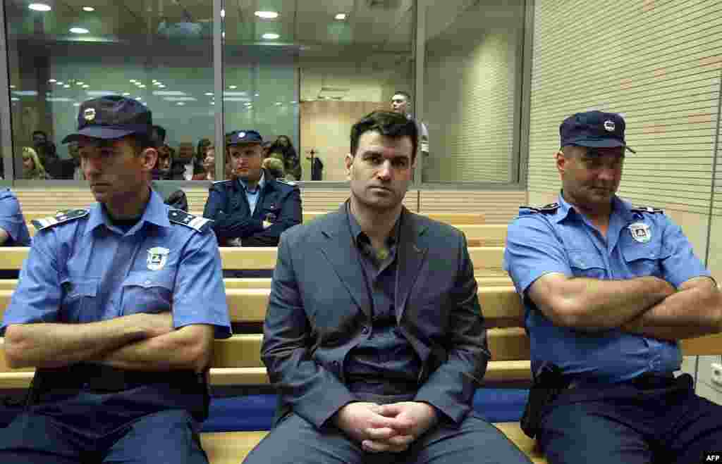Чоловік, що стояв за вбивством Джинджича, – колишній командир напіввійськового формування Мілорад Улемек на прізвисько Легія – в очікуванні суду 10 травня 2003 року. У 2007 році його разом з Звезданом Йовановичем засудили до 40 років позбавлення волі за вбивство прем’єр-міністра