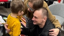 Freed RFE/RL Journalist Kuznechyk Feels 'Weight Lifted' At Seeing His Family