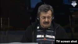 Slavko Puhalić kao svjedok odbrane pred Haškim tribunalom 2015. godine na suđenju Ratku Mladiću, osuđenom za ratne zločine i genocid u BiH.