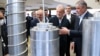 President Masud Pezeshkian (second right) and Atomic Energy Organisation of Iran chief Mohammad Eslami (right) on the National Day of Nuclear Technology in Tehran on April 9