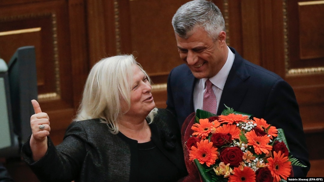President Hashim Thaci (right) sidestepped questions about the display of the image by Flora Brovina (left).