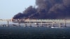 Наслідки удару українських військових по Керченському мосту в жовтні 2022 року, архівне фото