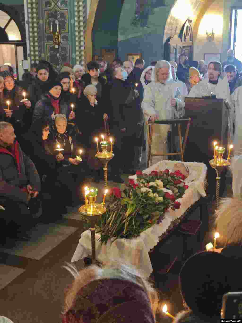 Family and friends gathered around Navalny's open casket. The general public was not allowed to file past the coffin, which is the custom at large Orthodox funerals.