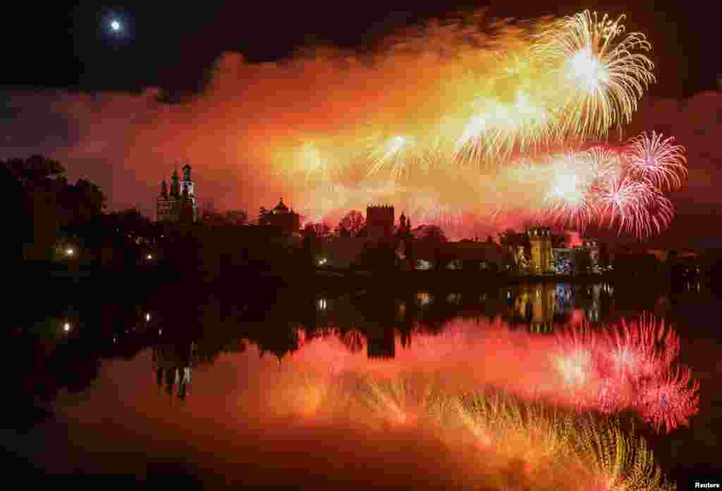 Fireworks explode behind the Novodevichy monastery during celebrations on May 9, the day on which Russia marks the anniversary of the victory over Nazi Germany in World War Two.