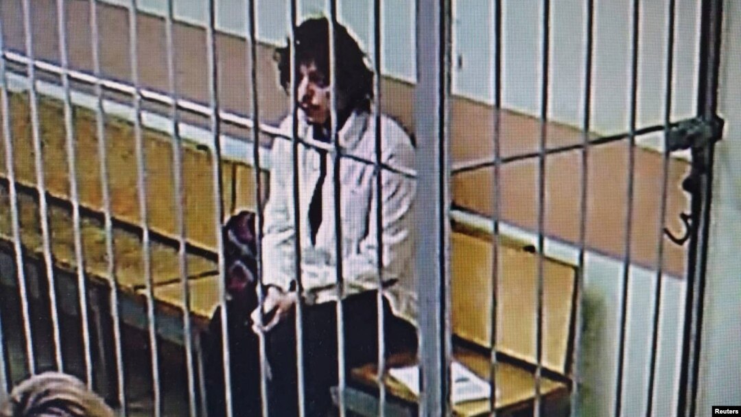 U.S. citizen Kalob Wayne Byers, detained on suspicion of drug smuggling, appears on a screen in the courthouse during a video link to a court hearing in Moscow on February 15.