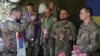 Ukrainian soldiers mark Easter at a frontline location in the Donetsk region on April 20.