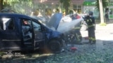 A fireman douses a car after a Russian attack on Ukraine's Sumy on June 3.