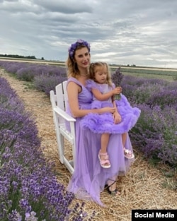 Iryna Dmytriyeva and her daughter, Liza, in a picture taken in a lavender field near Vinnytsya, just days before the child was killed in a Russian military strike.