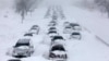 Anger is mounting in Russia after more than 80 people whose cars were stranded on a snowbound highway in Orenburg waited 16 hours to be rescued, resulting in one death and numerous cases of frostbite.