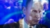 Președintele rus, Vladimir Putin, reflectat pe ecranul unei camere foto în timp ce se afla la o emisiune televizată