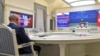 Russian President Vladimir Putin attends by a video conference a trilateral meeting with the leaders of Iran and Turkey on the topic of Syria, in Moscow on July 1, 2020.
