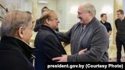 Belarusian leader Aleksandr Lukashenko greets Pakistani Prime Minister Shehbaz Sharif in Minsk on April 10.