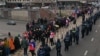 Georgian anti-government protesters form a "chain of unity" in Tbilisi on December 28.