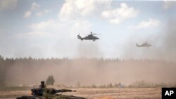 Lithuanian and German troops during an exercise Pabrade training ground