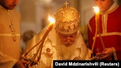 Georgian Patriarch Ilia II leads a midnight Christmas service at the Holy Trinity Cathedral in Tbilisi on January 7, 2018.