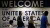 International passengers arrive at Washington Dulles International Airport after the US Supreme Court granted parts of the Trump administration's emergency request to put its travel ban into effect in 2018. (file photo)