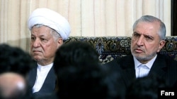 عبدالله جاسبی (راست) در کنار اکبر هاشمی رفسنجانی