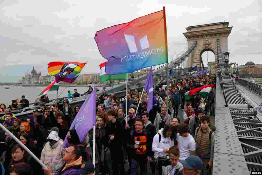 Protesters demonstrate on the Chain Bridge in Budapest after the Hungarian parliament voted on constitutional amendments targeting the LGBTQ community.