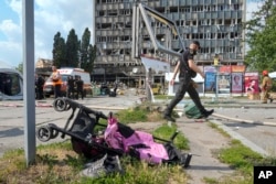 The stroller Liza had been sitting in when she was killed in the Russian missile strike.